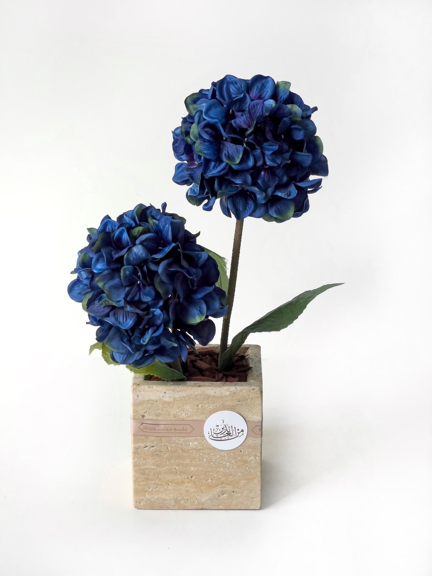 Travertine Vase with Blue Artificial Flowers – Eid Al-Adha Gift by Plumeria