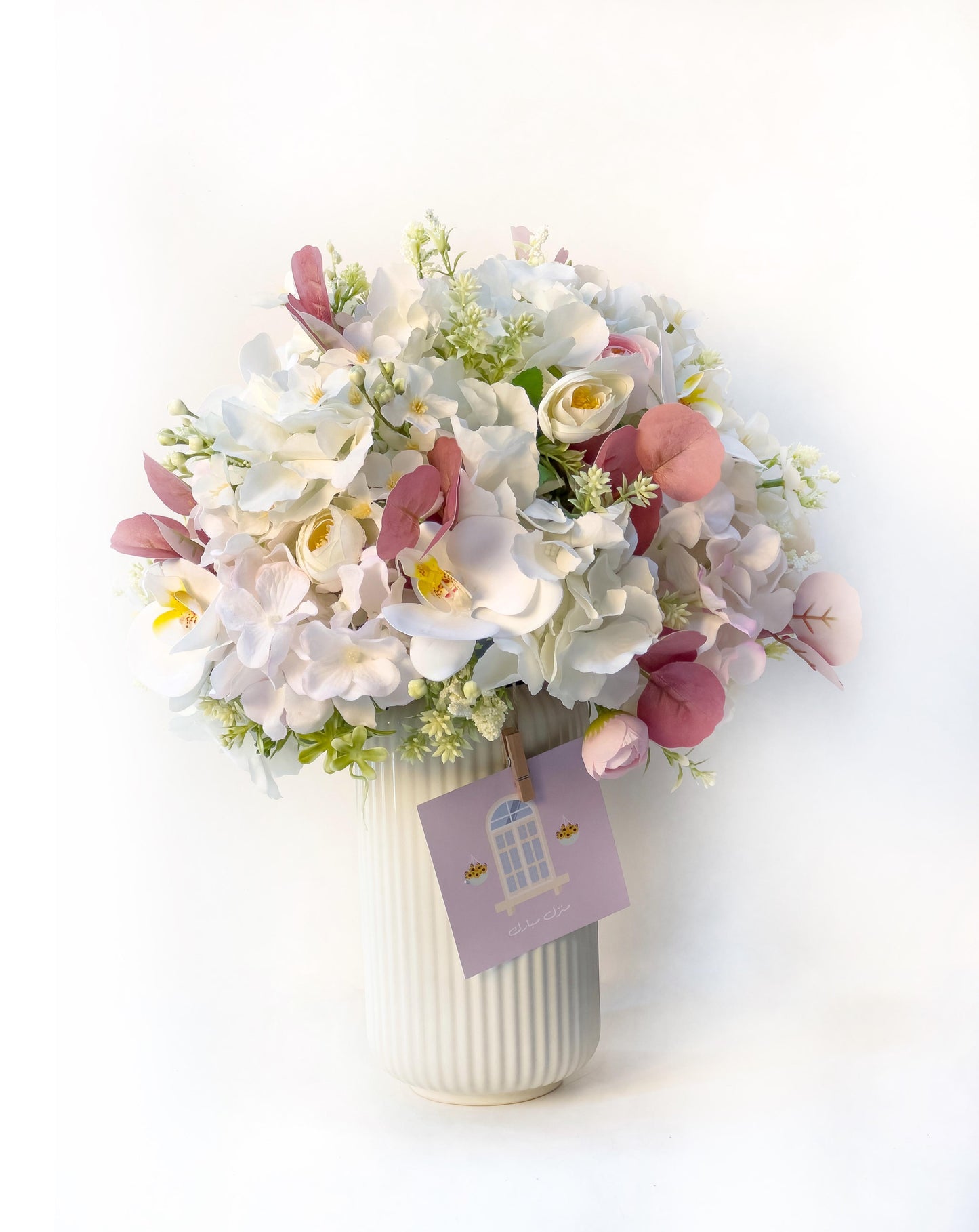Elegant White Vase with Soft Artificial Flower Arrangement