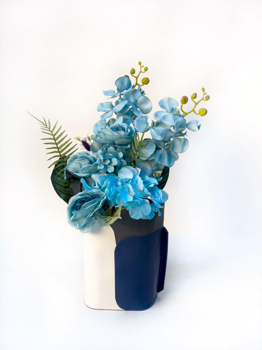 Artificial Floral Arrangement in a Luxury Leather Vase
